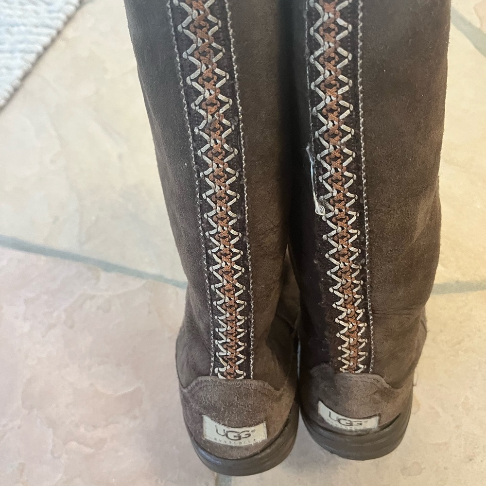 Chocolate UGGs high length with detailing on back seam